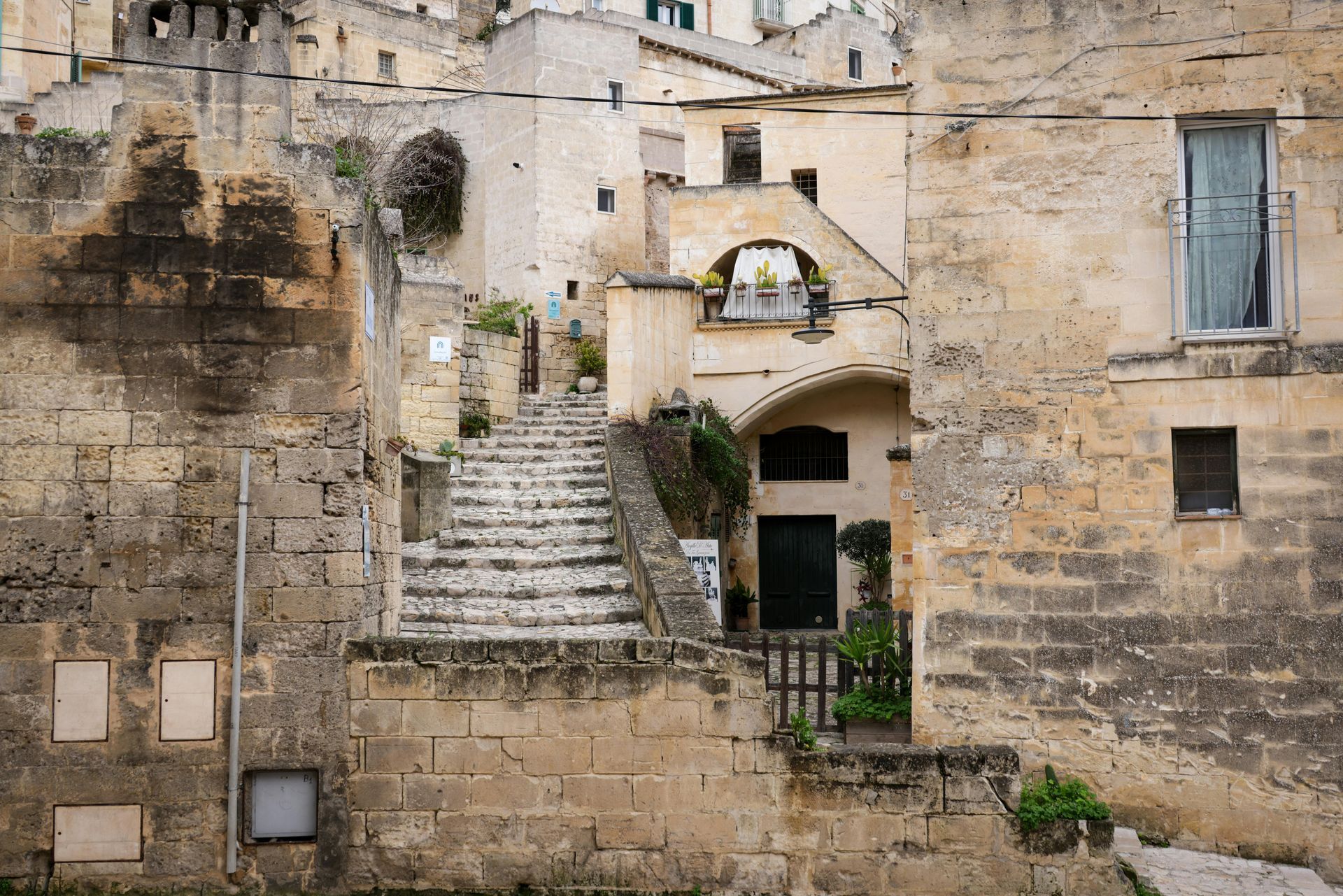Stone buildings and stairs in Matera, Italy.