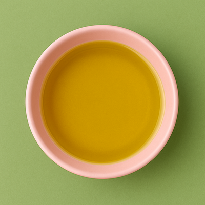 Pink bowl of yolive oil