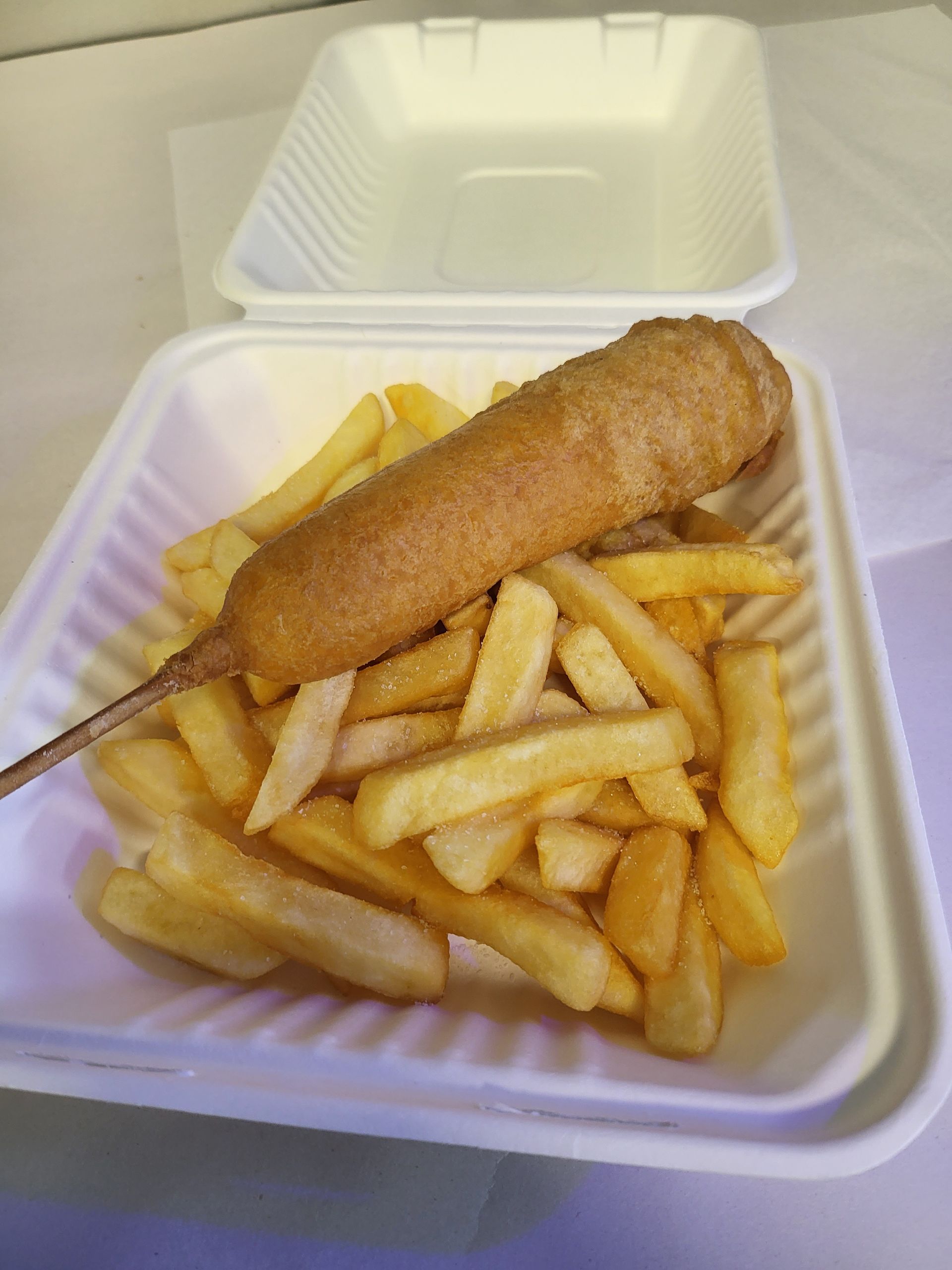 Corn dog and french fries in a styrofoam container, with the lid open. — Boundary Street Fish & Burger Bar in Railway Estate, QLD