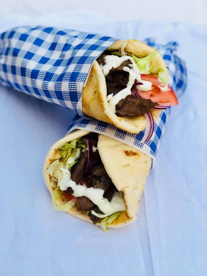 Gyro Wraps in Pita Bread, Filled With Meat, Vegetables — Boundary Street Fish & Burger Bar in Railway Estate, QLD