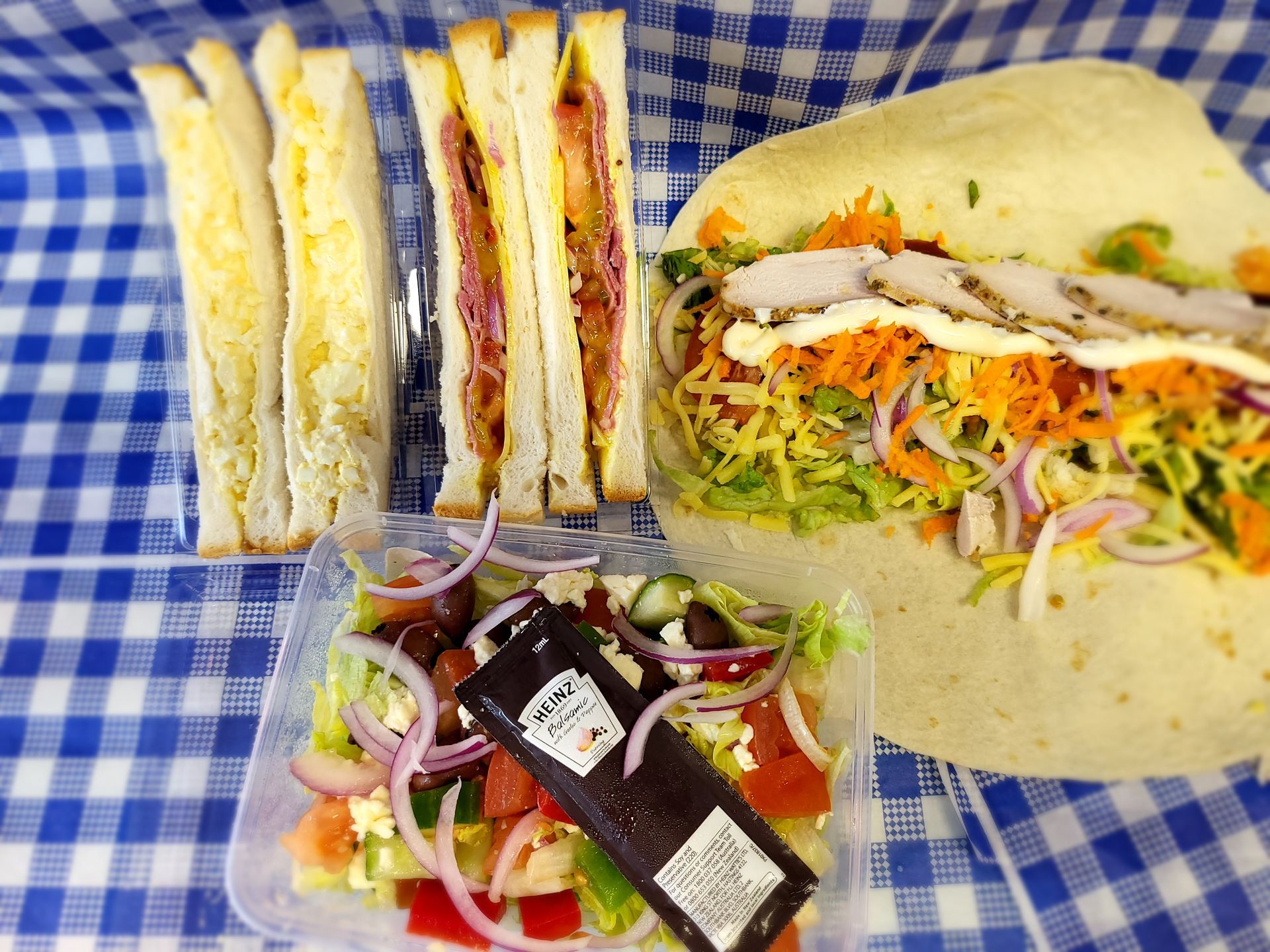 Sandwiches, Salad, and a Wrap — Boundary Street Fish & Burger Bar in Railway Estate, QLD