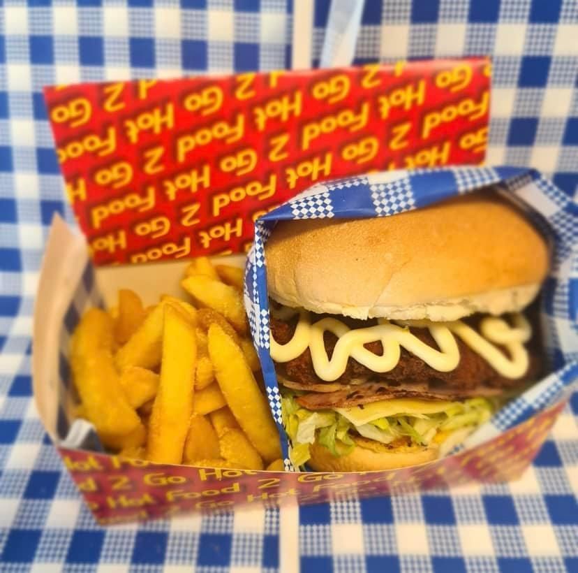 A Burger and Fries in a Branded Container — Boundary Street Fish & Burger Bar in Railway Estate, QLD
