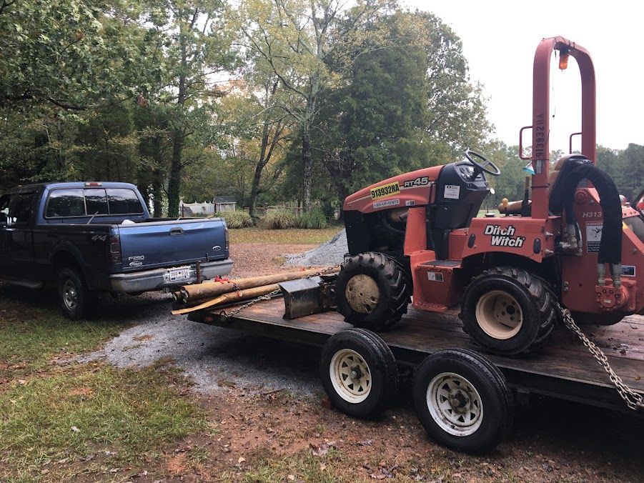 Southeastern Plumbing Excavators in back of pick up truck.