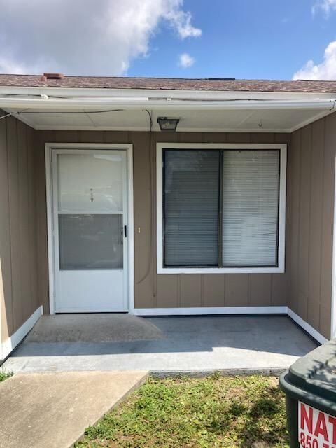 A small house with the number 1 on the door