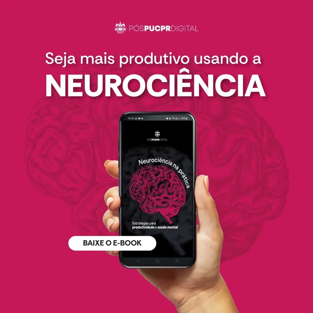 Uma mão segura um celular com um cérebro nele