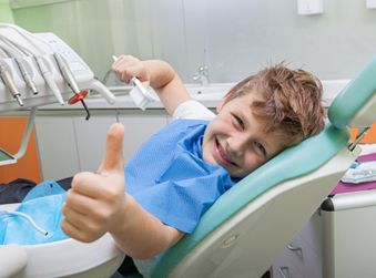 Happy Kid at the Dentistry - Teeth Whitening in Terre Haute, IN
