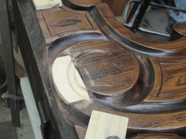 A close up of a piece of wood with a hole in it