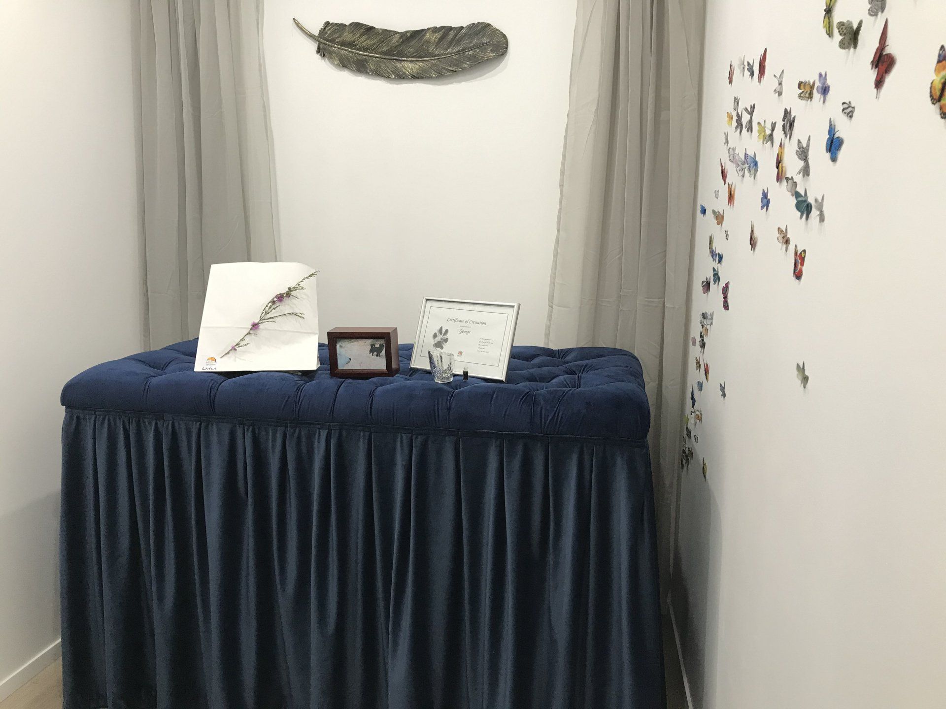 farewell room with photos and urns