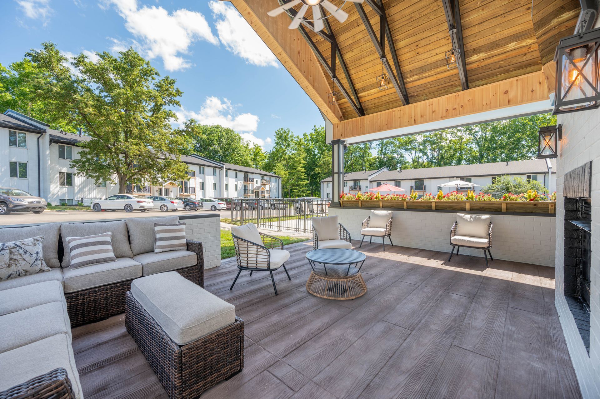 Outdoor lounge area with cushioned seating at 890 Loveland apartments
