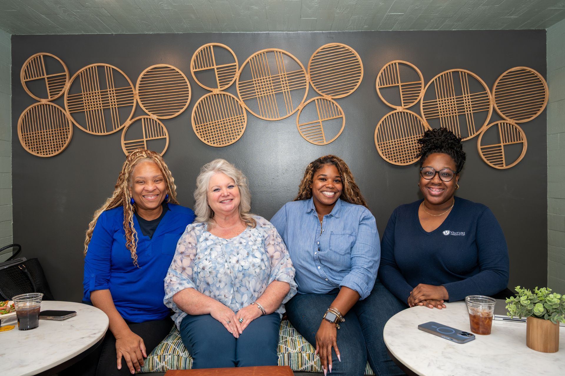 Venture teammates sitting together at quarterly happy hour.
