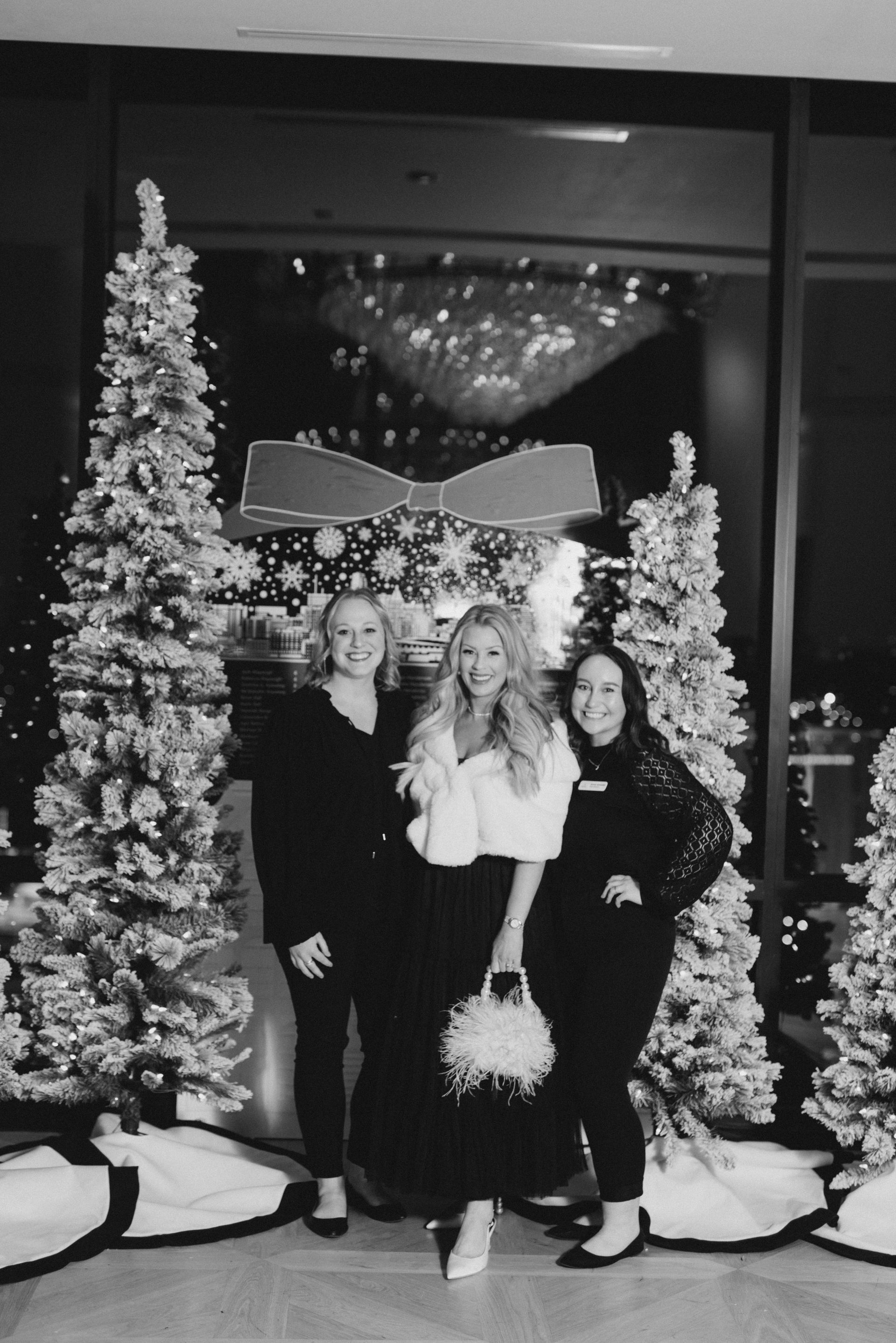 Christmas tree with holiday decorations at Venture Communities event