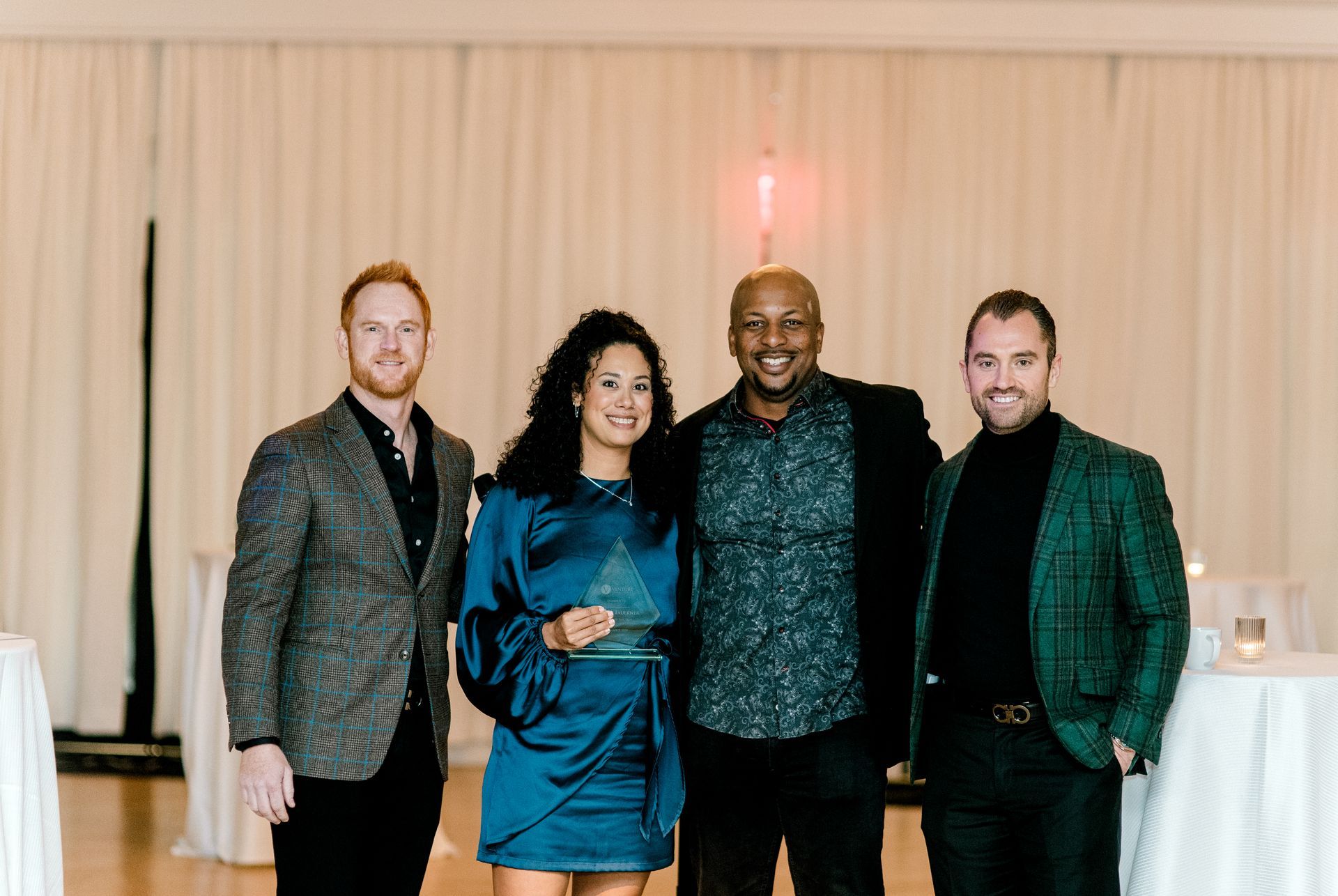 Team members enjoying the Venture Communities holiday party