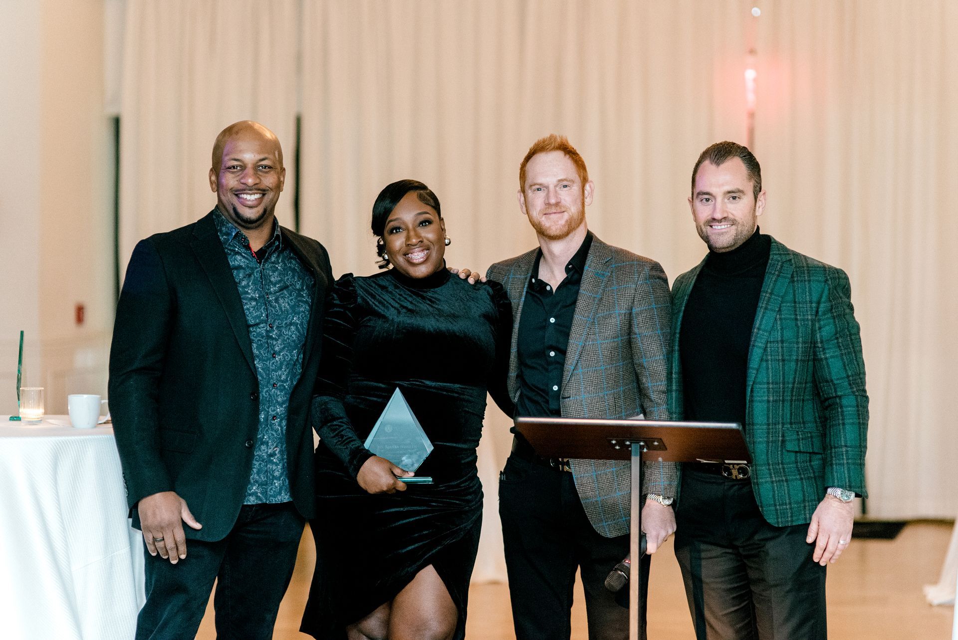 Team members enjoying the Venture Communities holiday party