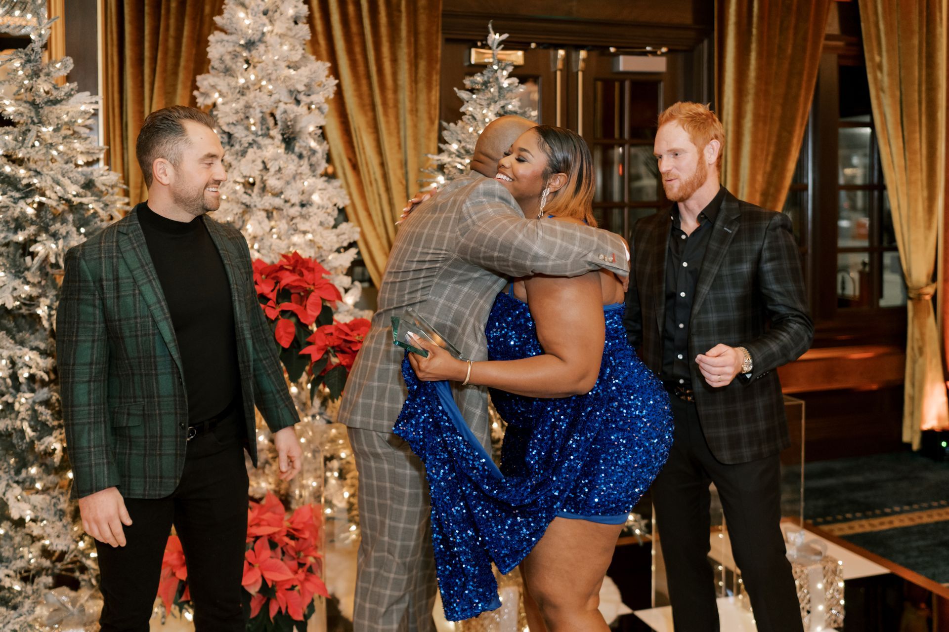 Team members enjoying the Venture Communities holiday party