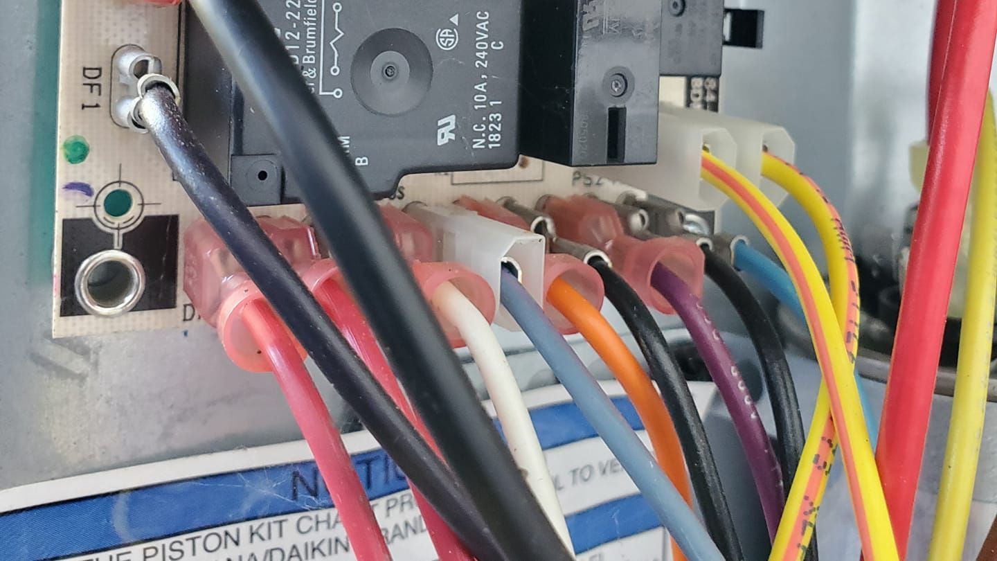 A bunch of wires are connected to a circuit board.