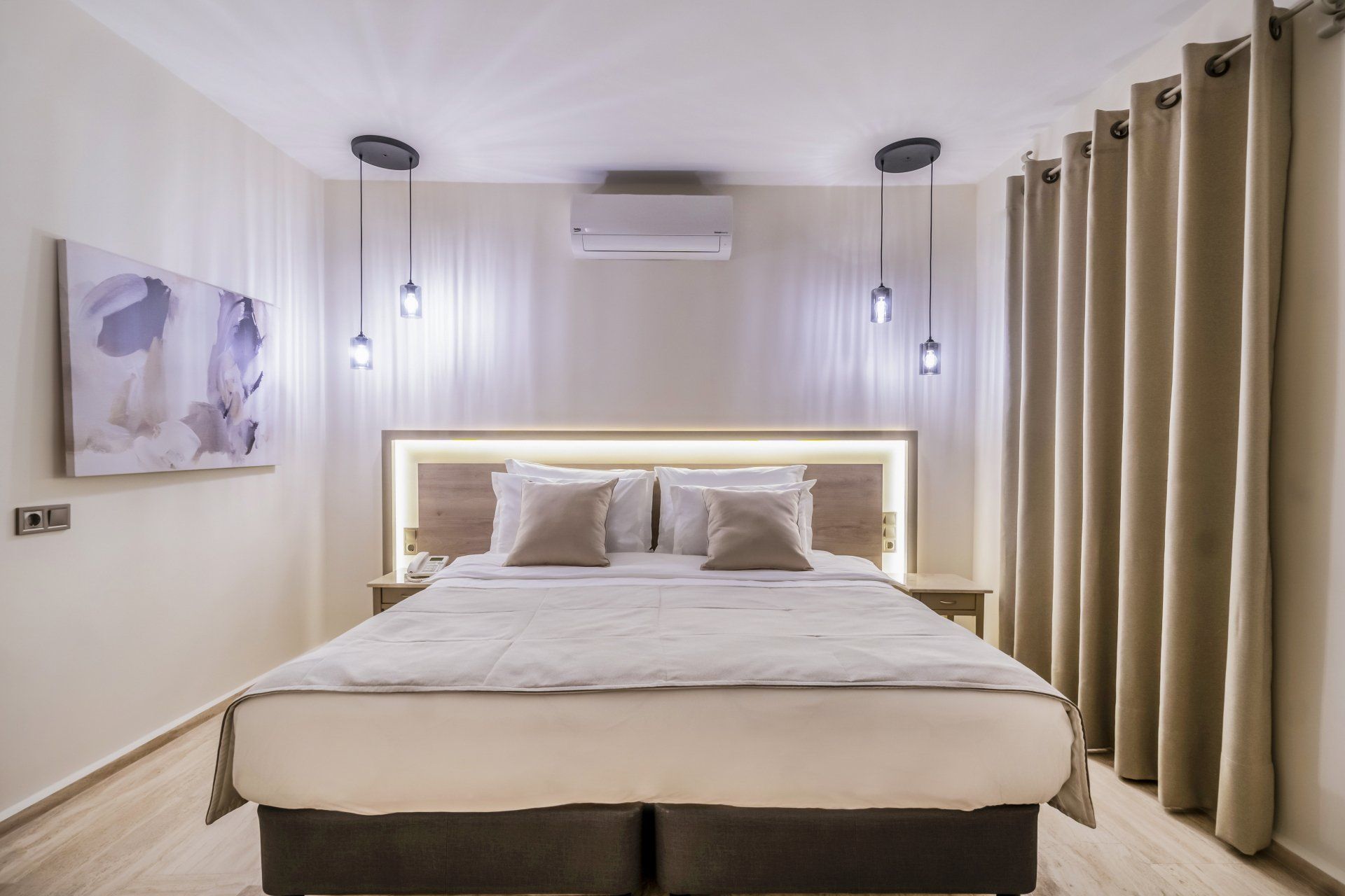 There is a large bed in the middle of the room.