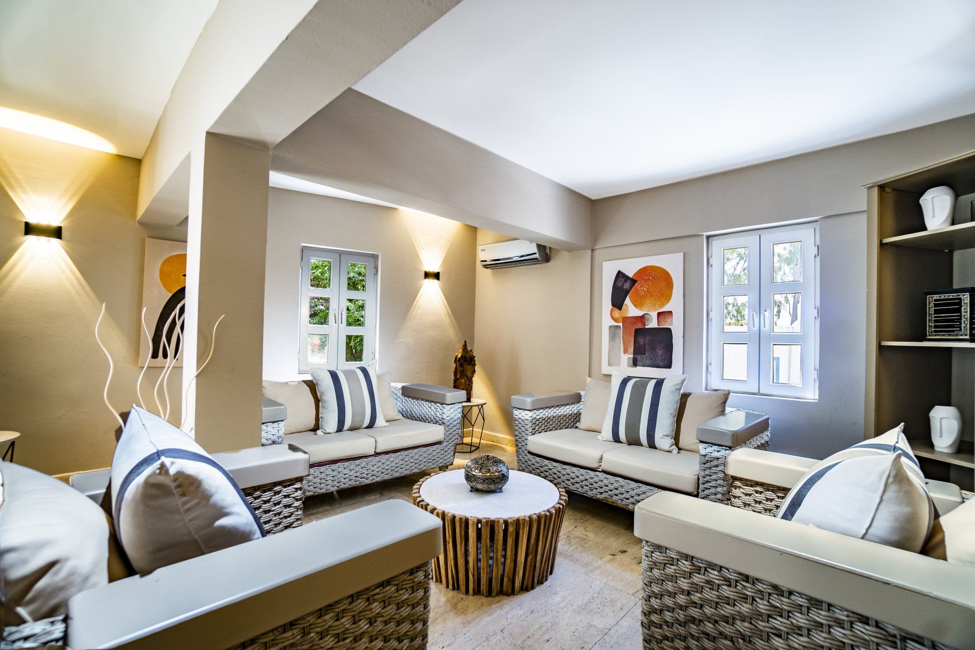 A living room with a lot of furniture and a table