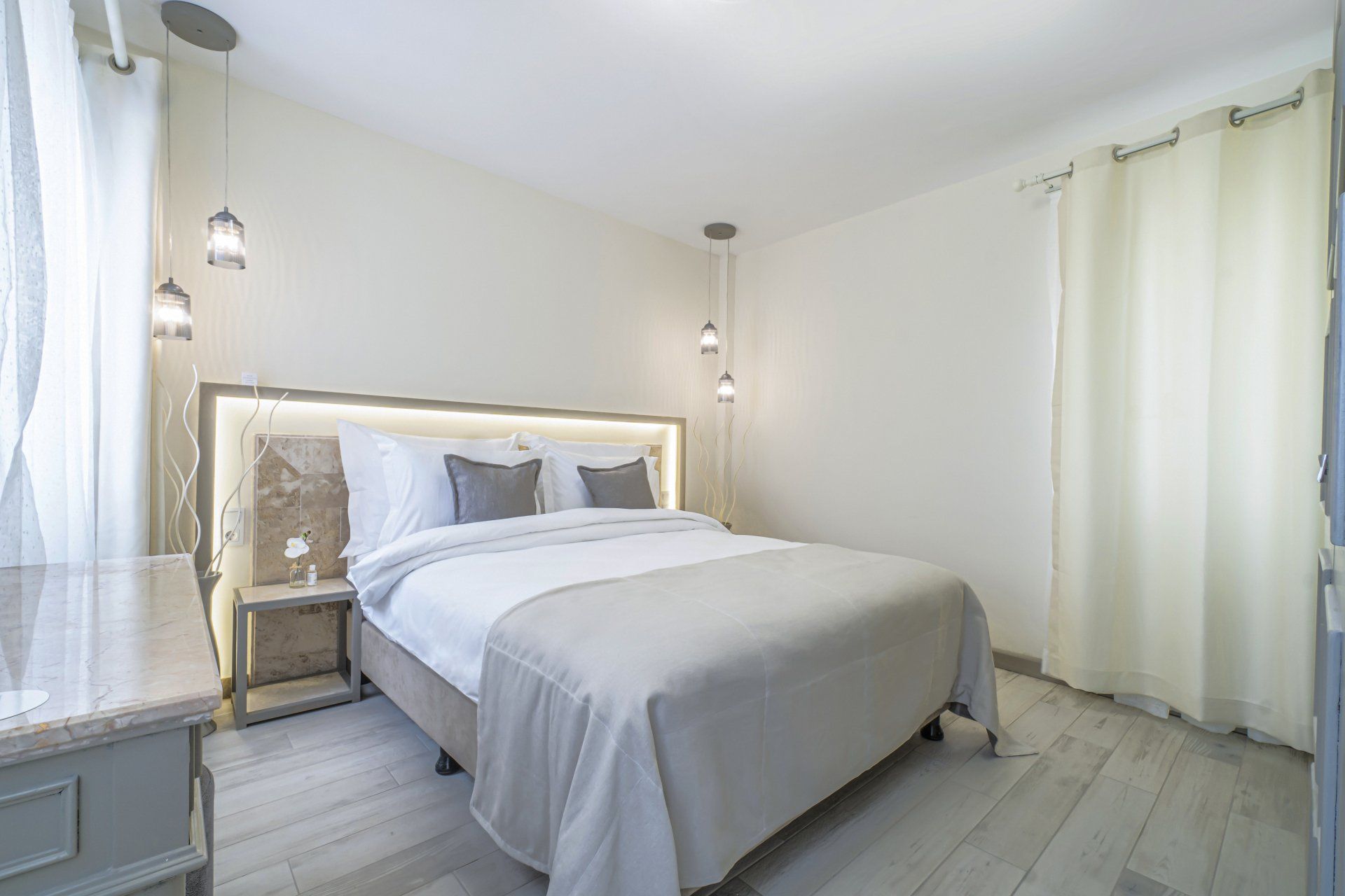 There is a large bed in the middle of the room.