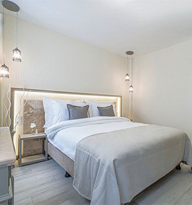 There is a large bed in the middle of the room.