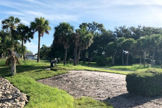 Worker laying sod — Palm City Sod in Palm City, FL