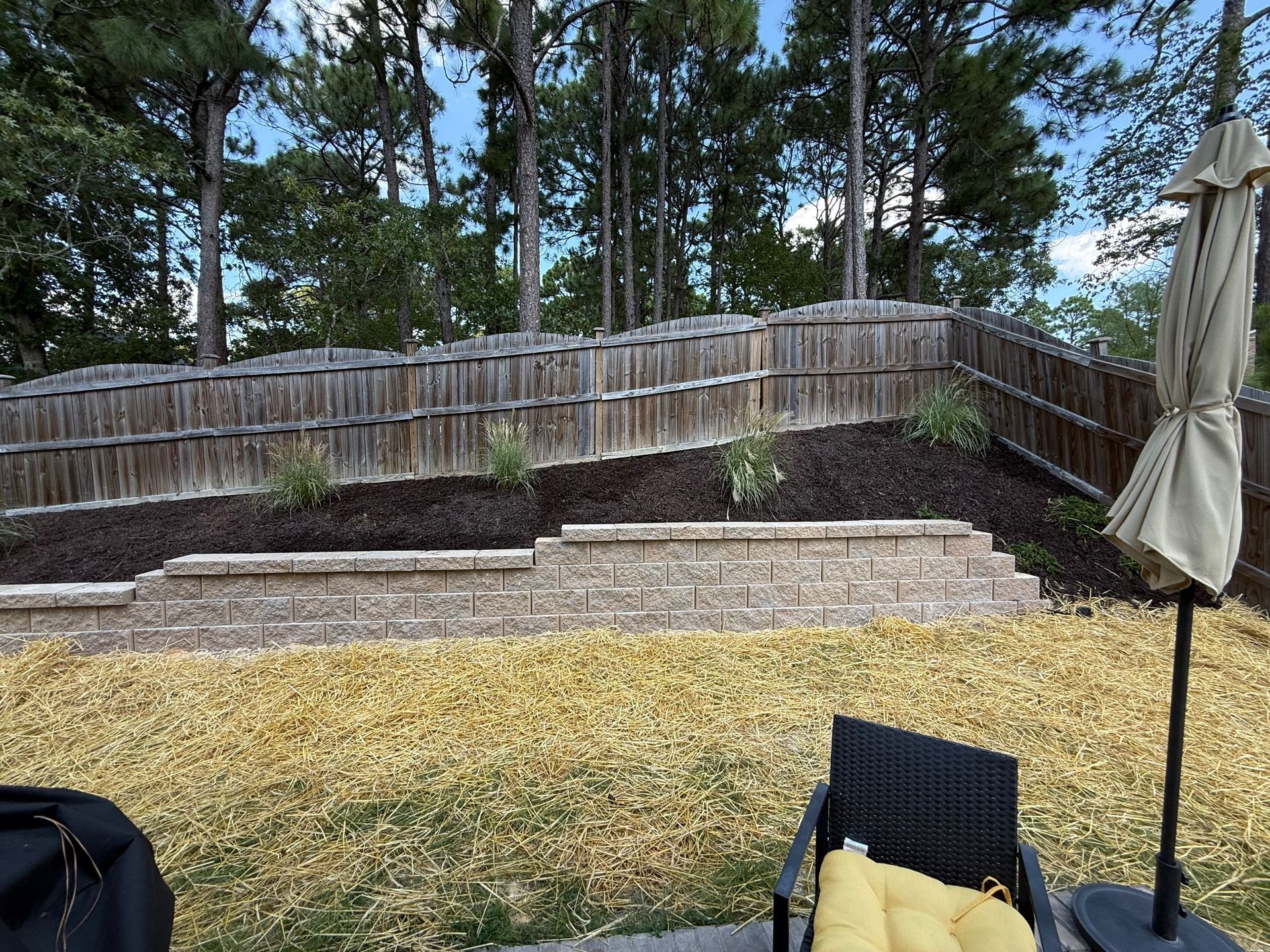 A man is working on a kitchen in a house under construction