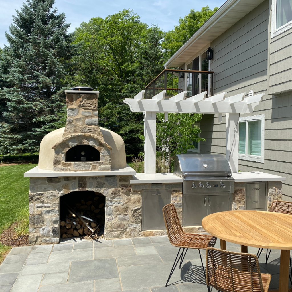 A room under construction with a ladder and a stool on the floor.