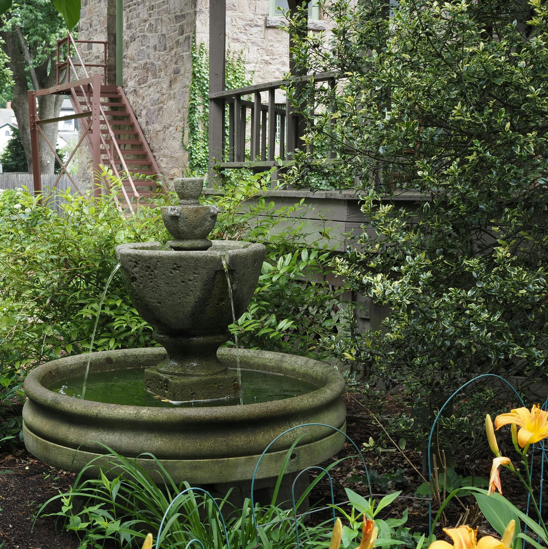 A foundation for a house is being built on a dirt field.