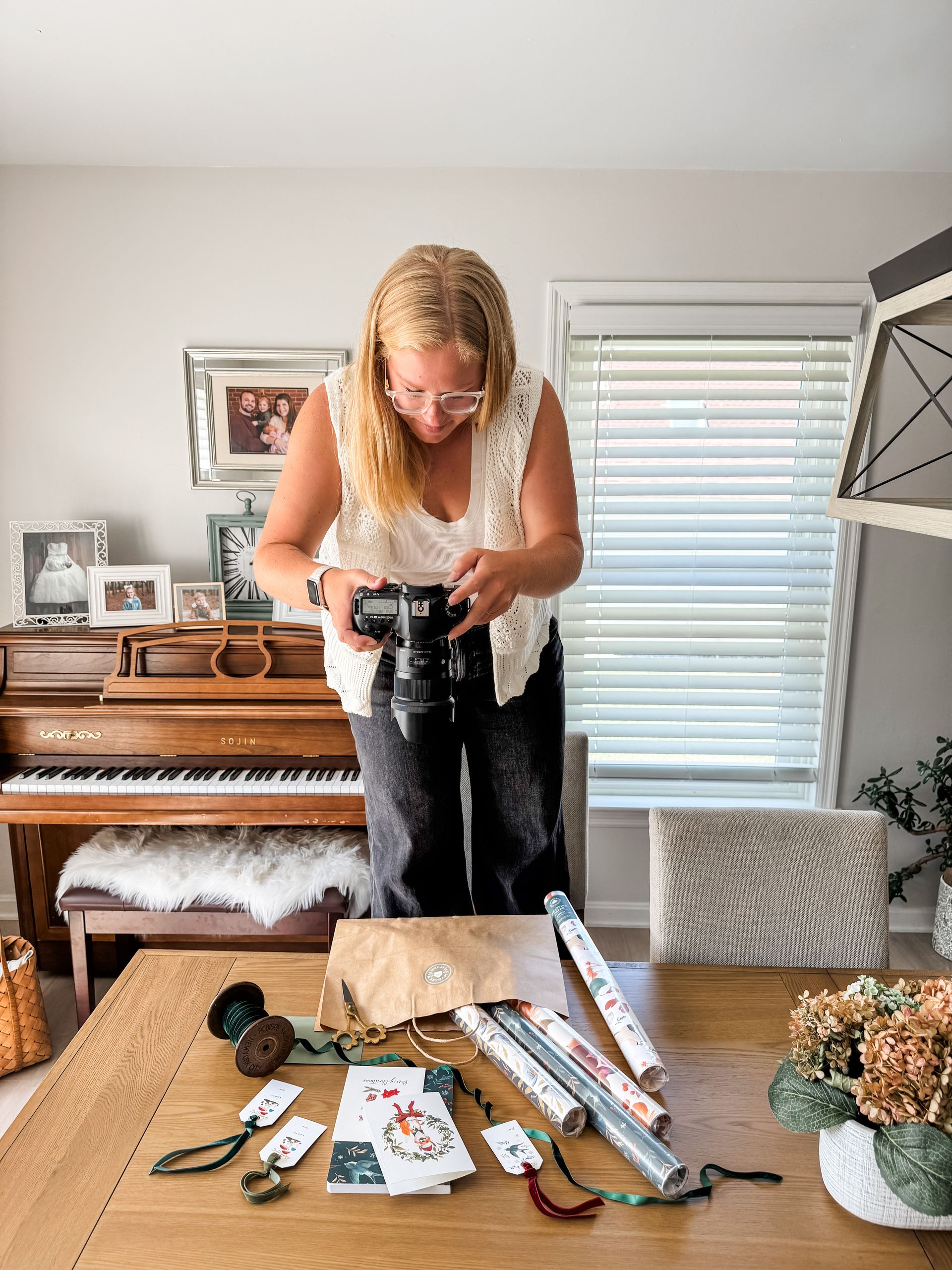 Photographer taking a flat lay photo at Studio Hearth & Home Lancaster PA
