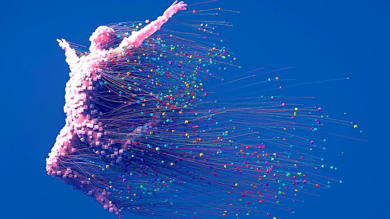 A digital human made of blocks and wires jumping into the air