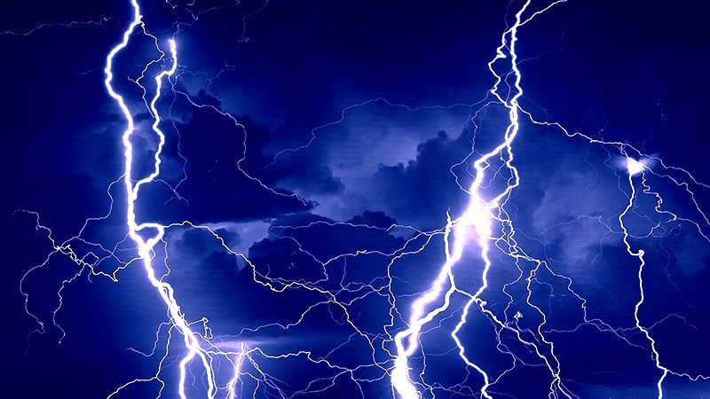 Lightning strike in dark sky