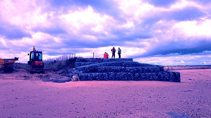 The construction of a sea wall at the Naze