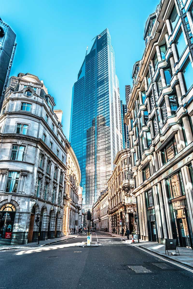 Financial District in London. Looking down a street to a skyscraper in background