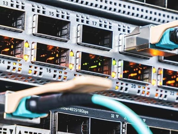 Close up of a data centre stack with ports and wires visible