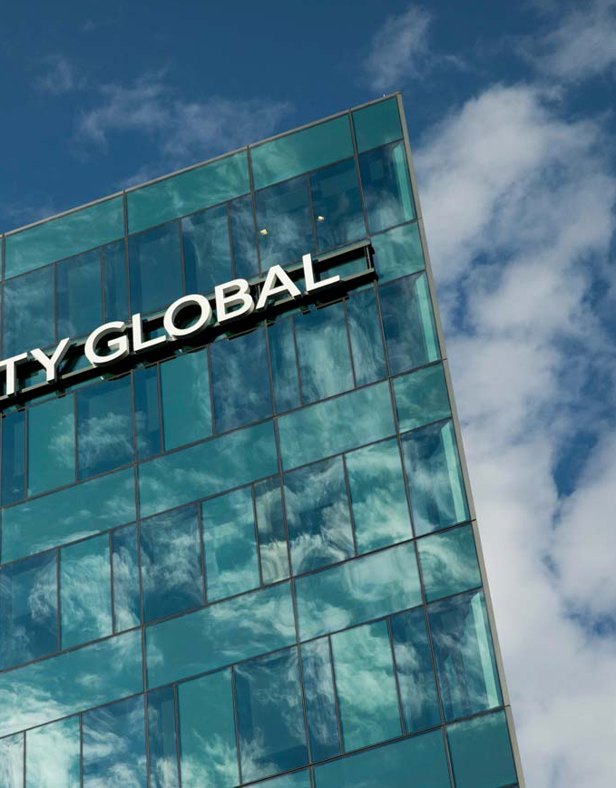 Close-up of skyscraper with Liberty Global name