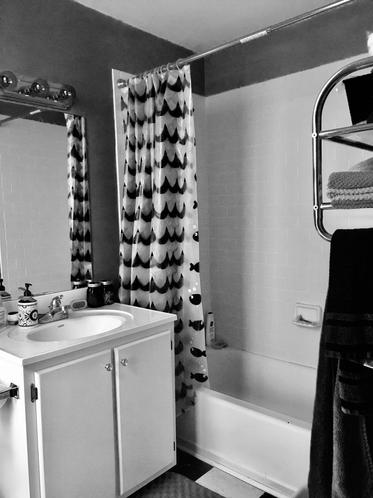 Interior of bathroom with white fixtures