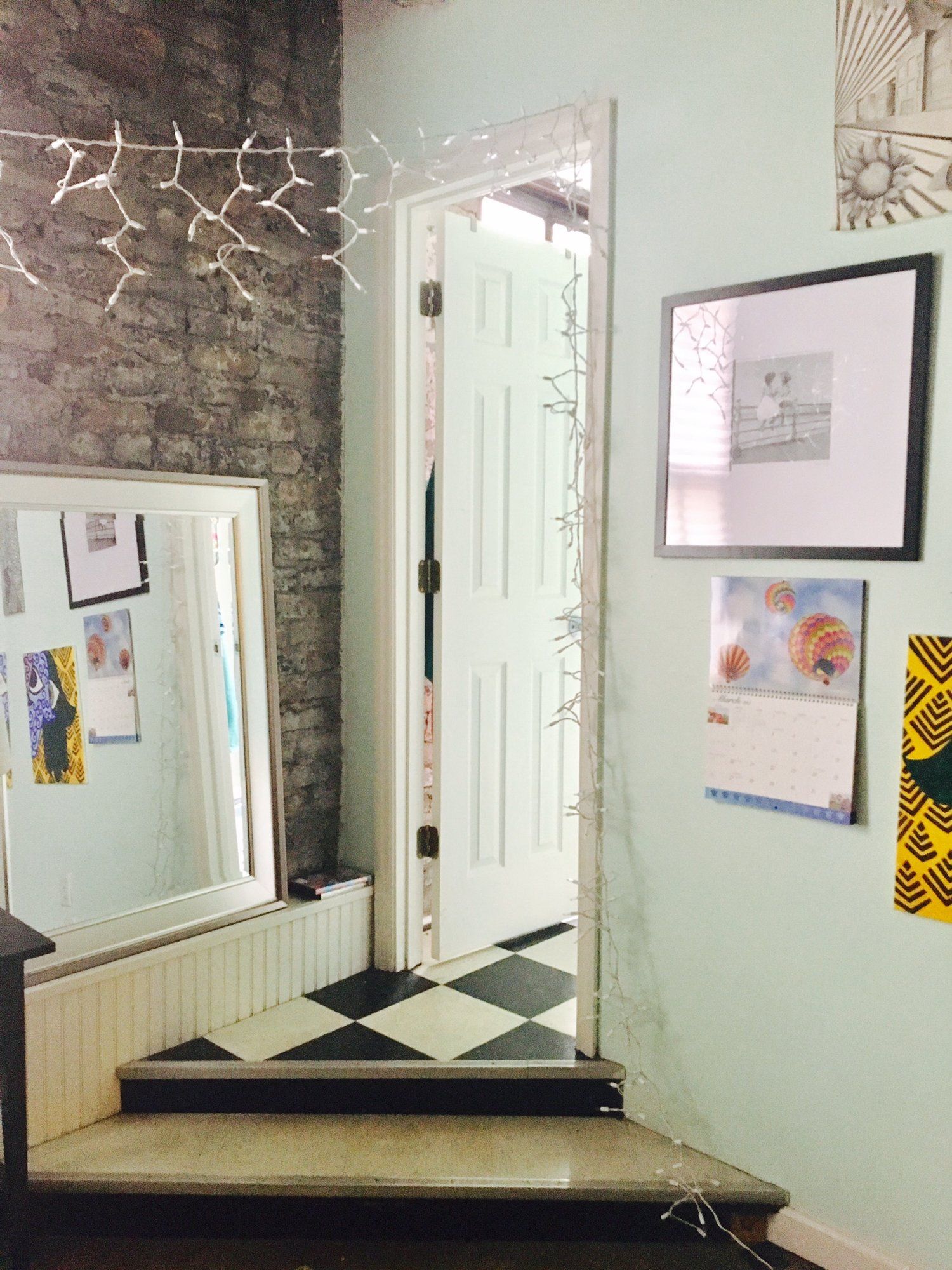 Interior of entryway with checkered flooring