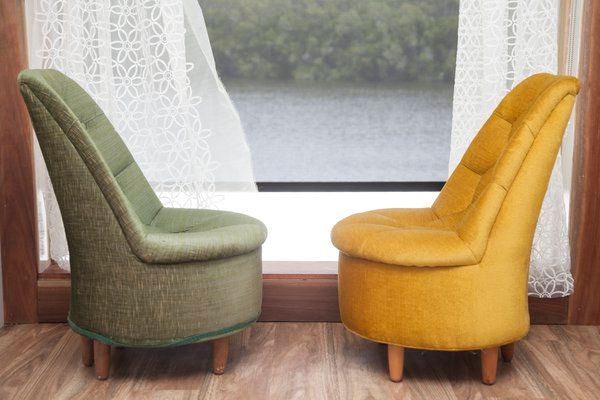 Two Chairs Are Sitting Next to Each Other in Front of a Window — Psychology Practice In Tweed Heads, NSW