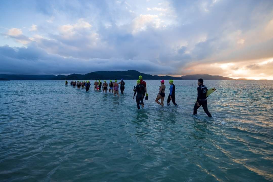 A Group of People Are Walking in the Water — Psychology Practice In Tweed Heads, NSW