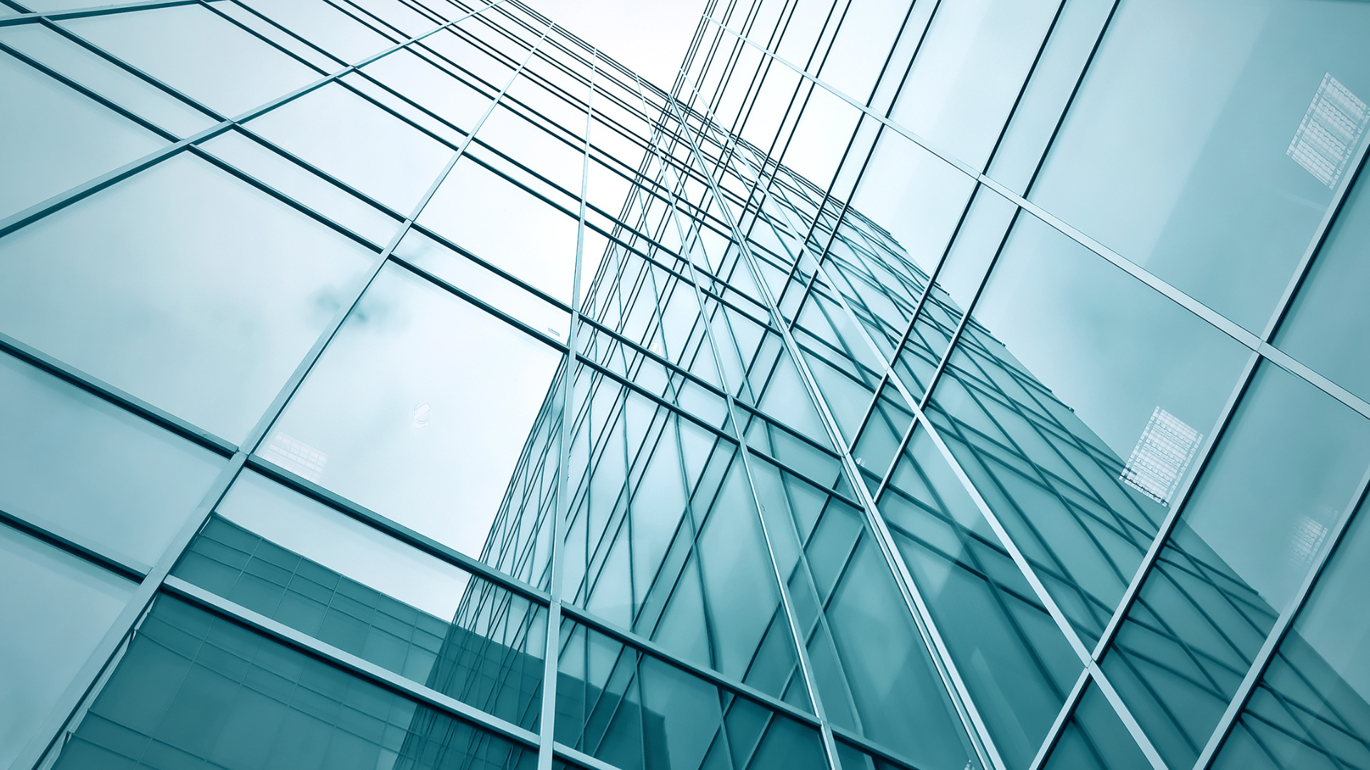 Looking up at a tall building with a lot of windows