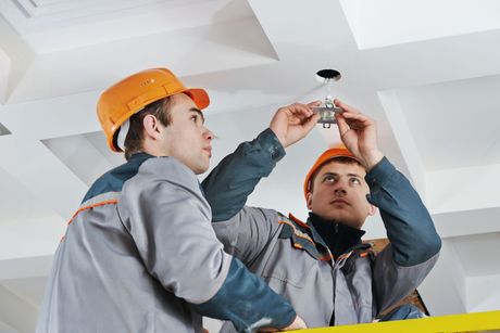 Electricians Installing Light in Roof - Griffiths Innovative Electrical, Anna Bay NSW