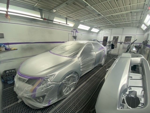 Red Car Under The Tree — Panel Beaters in Mitchell, ACT