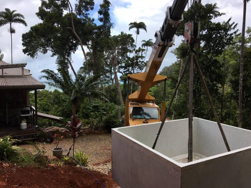 A Large Concrete Box is Being Lifted by a Crane — Kelly's Crane Hire in Mossman, QLD