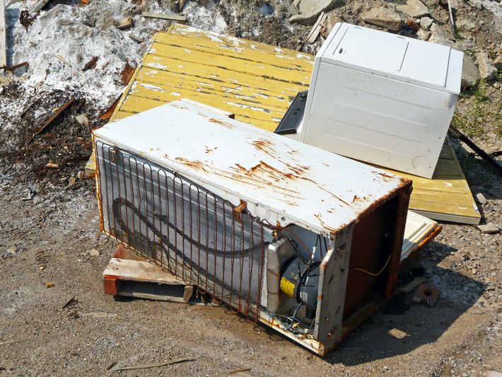 old appliances in a pile waiting to be removed in colorado springs co