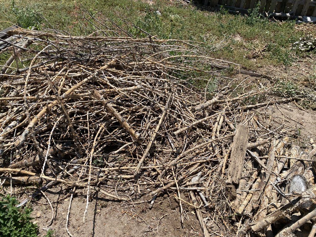 yard waste in a pile to be removed in colorado springs