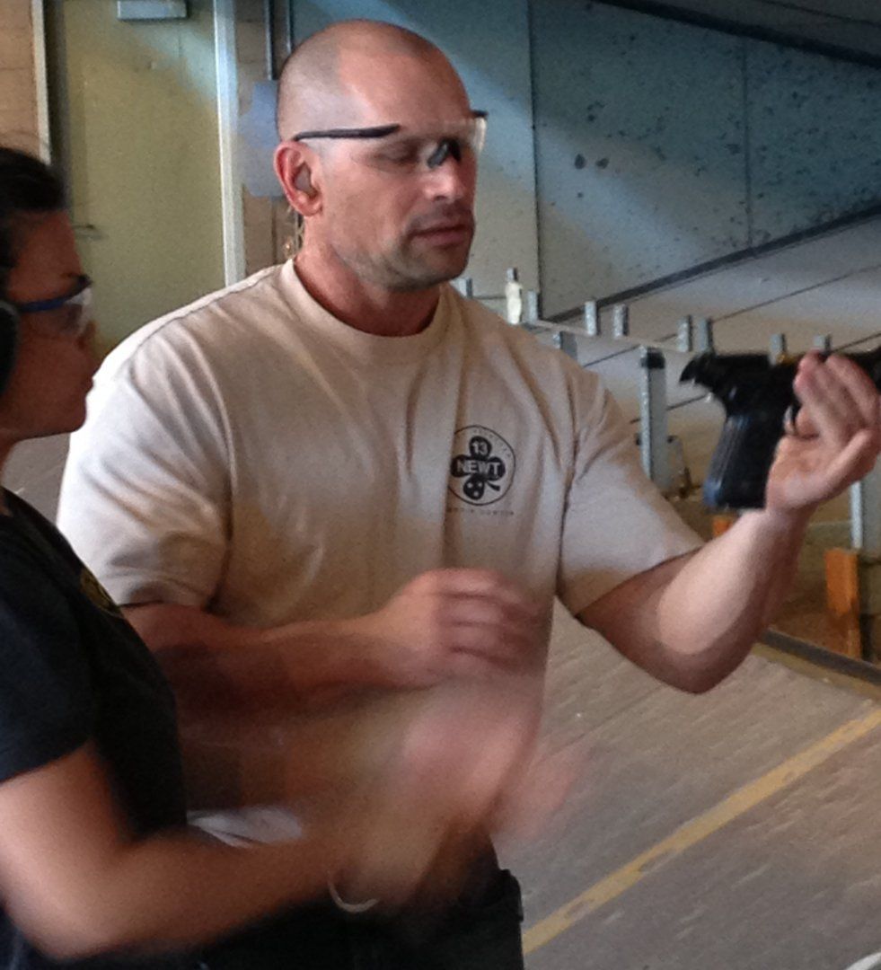 CW Security Group Inc owner providing firearm training at a facility in Nashville, TN