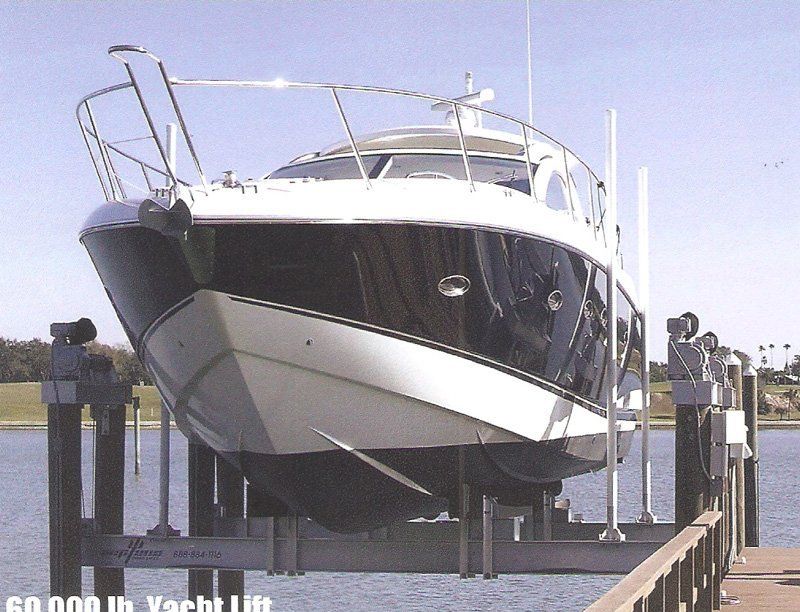 Lifts — White and Black Boat in Miami, FL