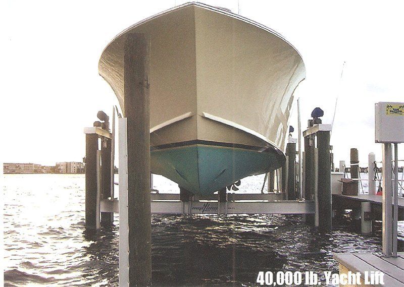 Elevators — Yellow and Blue Boat in Miami, FL