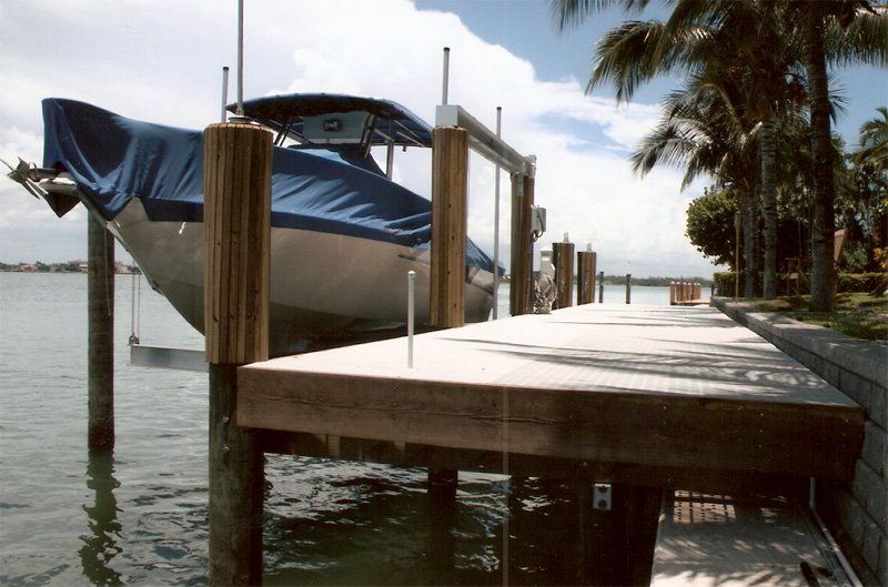 Construction Services — Dock with Boat in Side in Miami, FL