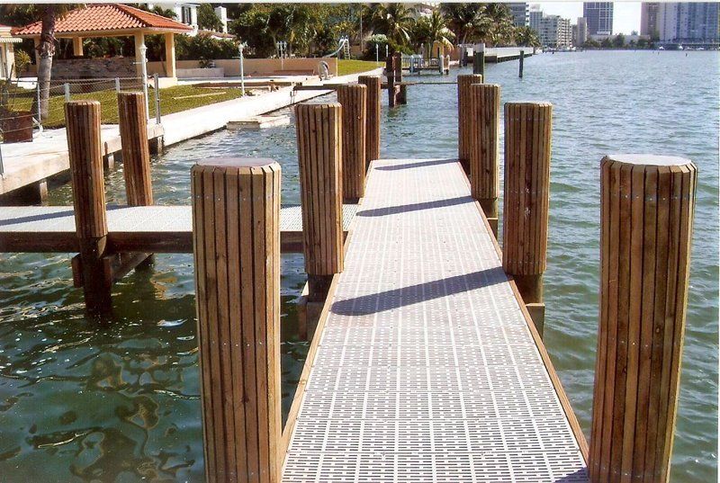 Boats — Dock With Wood Posts in Miami, FL
