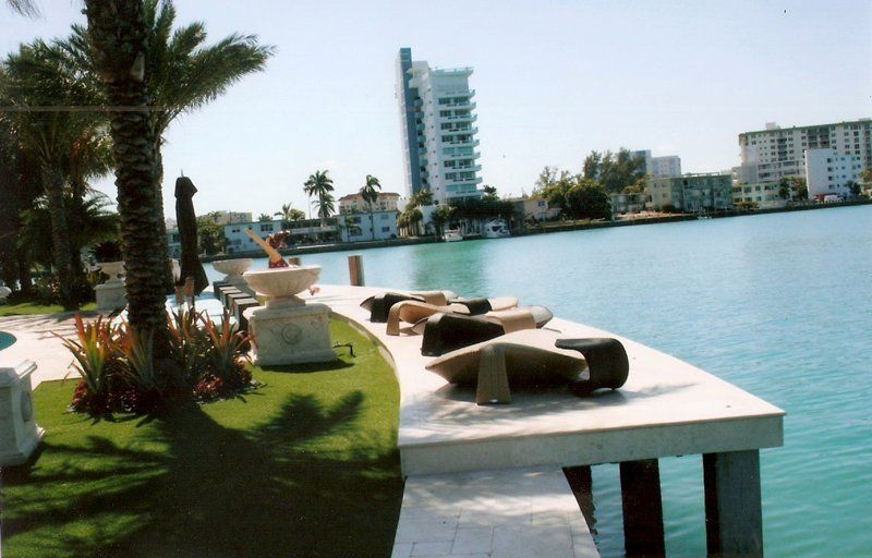 Concrete Deck — Chairs And Statues On Deck in Miami, FL